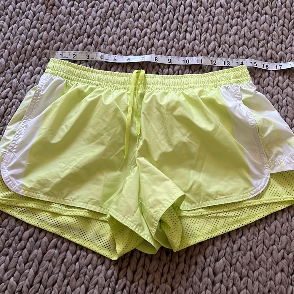 Stella McCartney running shorts in neon yellow/green